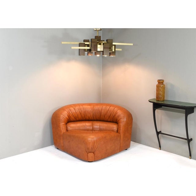 Rossi di Albizzate Corner Lounge Chair in originale tan leather, Italy, 1970s An exceptional corner lounge chairs by Rossi...
