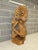 An extraordinary, highly detailed mid-century Balinese Art Deco sculpture depicting a seated Janger dancer gracefully...