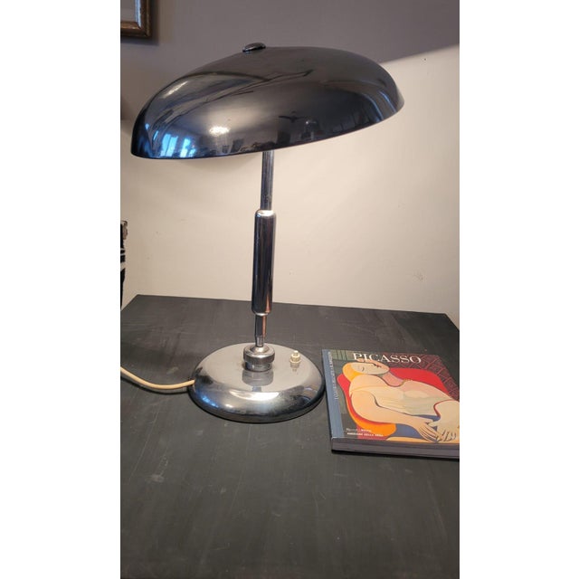 Elegant and rare ministerial table lamp in chromed metal, designed by the Italian architect Giovanni Michelucci and made...