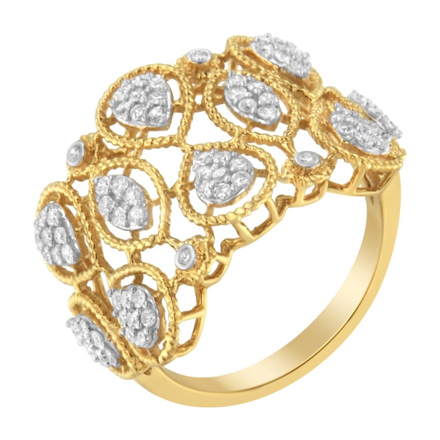 This 14kt yellow gold band brings a mix of a art deco looks with floral elegance to your hand. Pear-inspired clusters and...