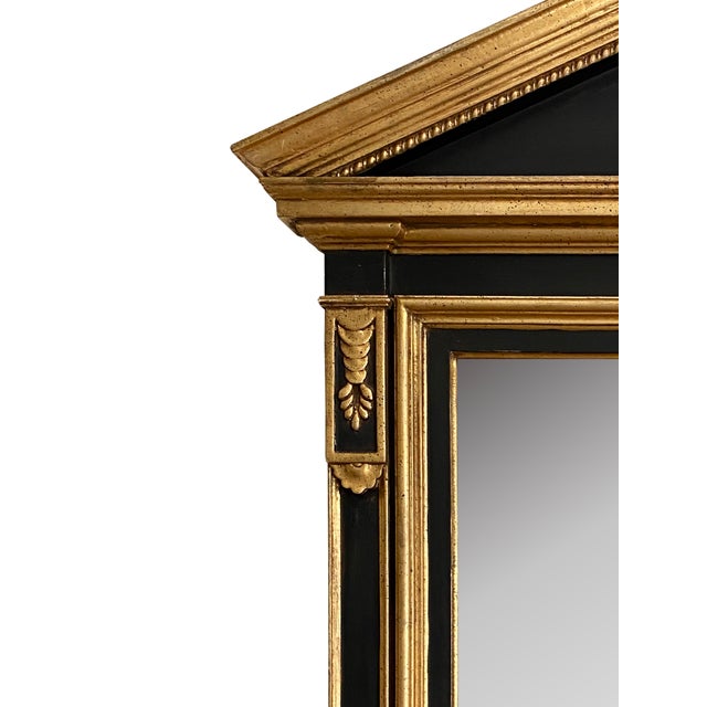 A beautiful Neoclassical-style mirror, hand-crafted in Italy. The large frame is masculine and elegant with chunky stacked...