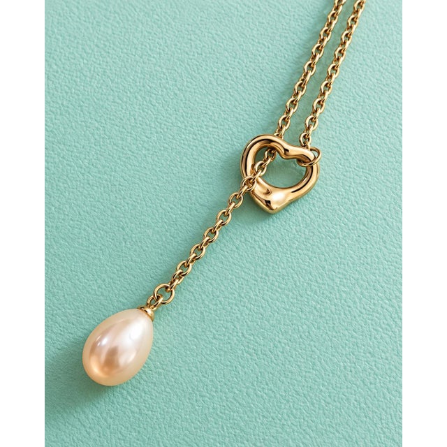 Metal Tiffany & Co Elsa Peretti 18k Yellow Gold Open Heart Lariat Necklace For Sale - Image 7 of 9