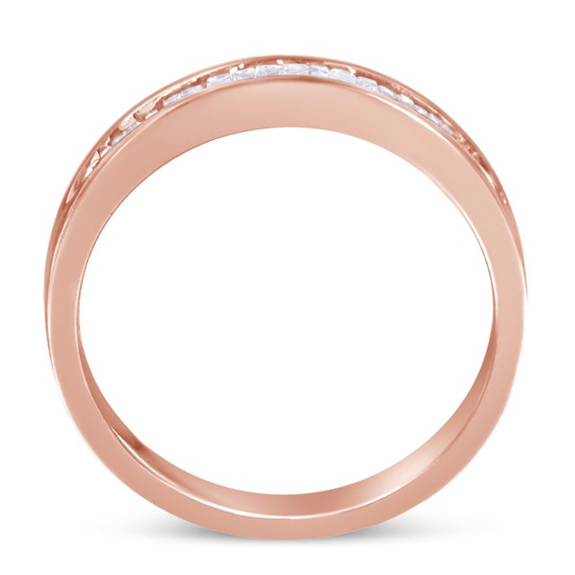 Sparkling with 17 sleek baguette-cut stones, this elegant and understated diamond wedding or anniversary band will be sure...