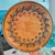 Large 16" round hand-painted terracotta platter produced by FF Griffi in Corsica, France.