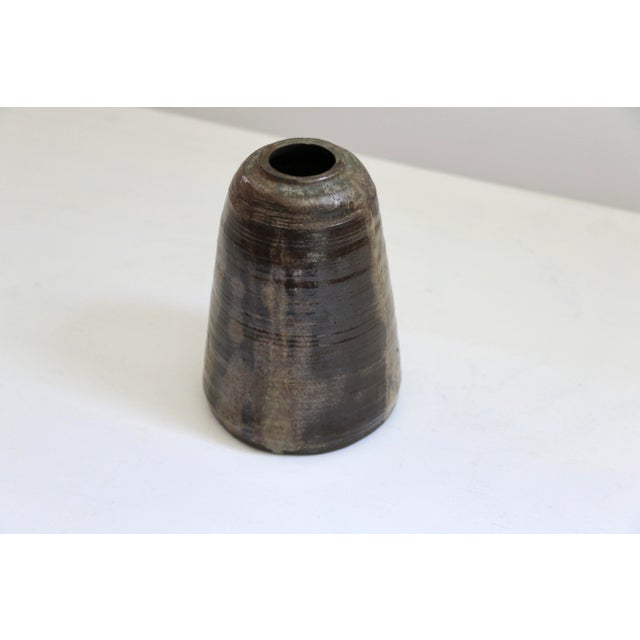 Vintage studio pottery vase in tonal browns.