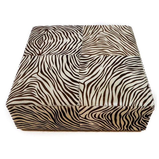 Vintage zebra printed horse hair oversized square ottoman on wood plinth base. Seamed with four squares on the top, this...