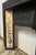 This vintage English firebox mantel insert is a stunning blend of craftsmanship and artistry, offering an elegant touch to...
