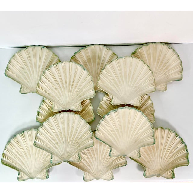 This is a lovely set of Tromp L’Oeil Clam Sea Shell Dinner Plates. The ceramic ware plates are in a clam shell shape in an...