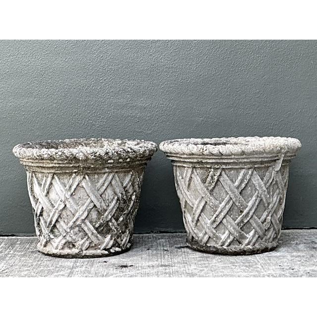 Add a touch of timeless architectural interest to your outdoor oasis with this distinguished pair of vintage cast concrete...