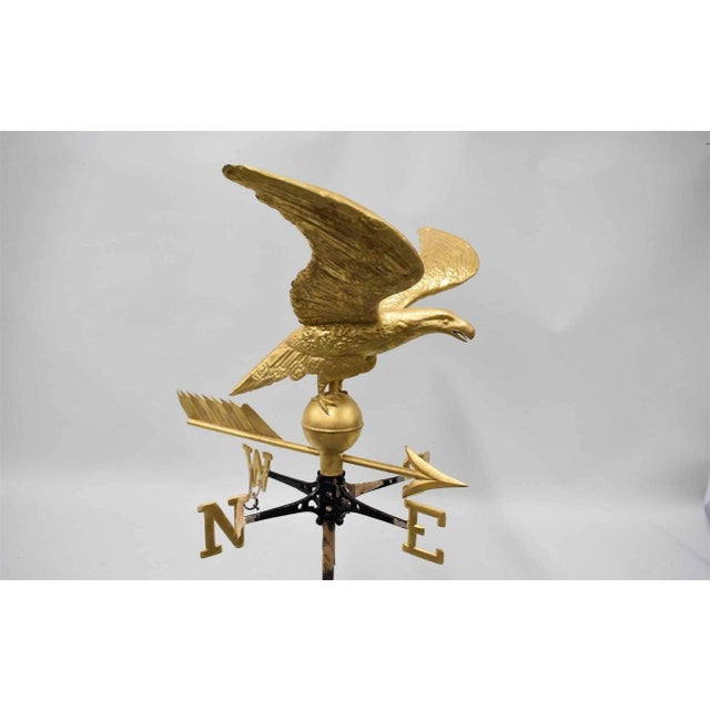 Gilt-Painted Eagle-Form Copper Weathervane. Used condition, wear, worn, chips. 65”H with pole x 25”W from wing to wing x...