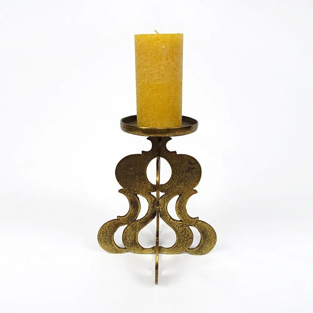 Heavy black copper candlestick for one thick candle. This wonderful mid-century modern item has an openwork brutalist foot...