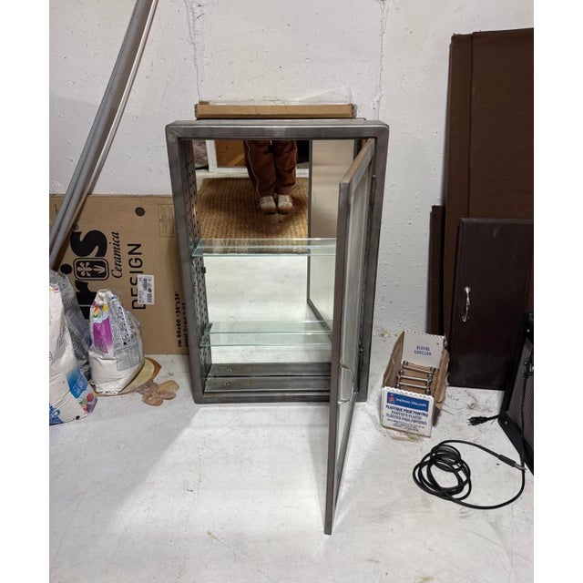 Pharmacy wall hung Cabinet from a retired line. Incredibly solid with expert craftsmanship and high-quality materials....