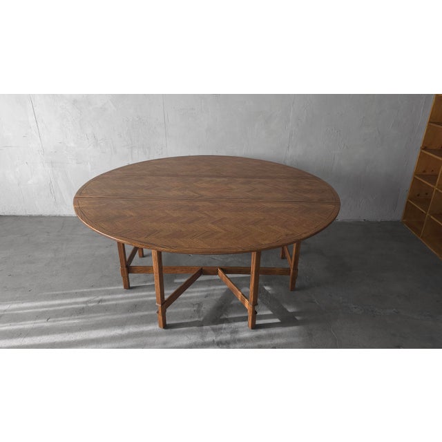 This vintage parquet oak, drop leaf dining table is both beautiful and functional in so many ways. This grand table...