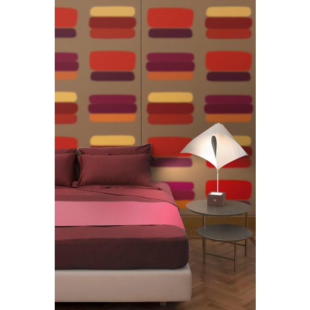 “the idea is to experiment on the fabric different techniques of representation, to define an essential element like a...