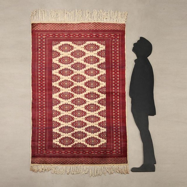 Bukhara rug in cotton and wool, fine knot and hand-made. In good condition. This piece is attributed to the mentioned...