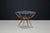Carlo De Carli “Spider” Sculptural Walnut and Glass Coffee Table, Italy, 1950s An exceptional and highly sculptural...