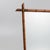 A striking French faux-bamboo mirror dating to circa 1900, distinguished by its sculptural turned-wood frame, warm maple-...