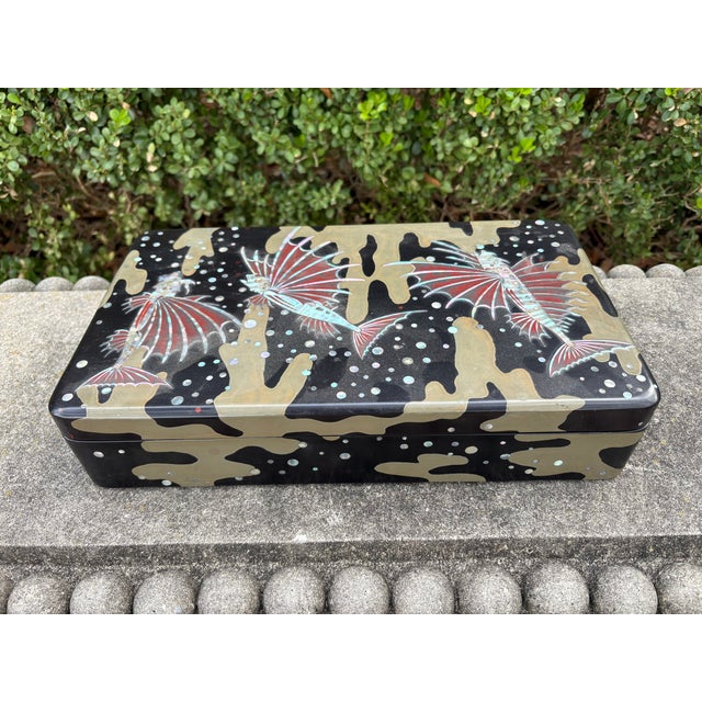 Antique Japanese Lacquered Box. Offered is a beautifully detailed Japanese lacquered box that dates to the 1920's. This...