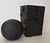 This Matt Black Brutalist Ball and column Sculpture By GEO is in new condition. Measures 3 1/4W x 3 1/4D x 8 inches and...
