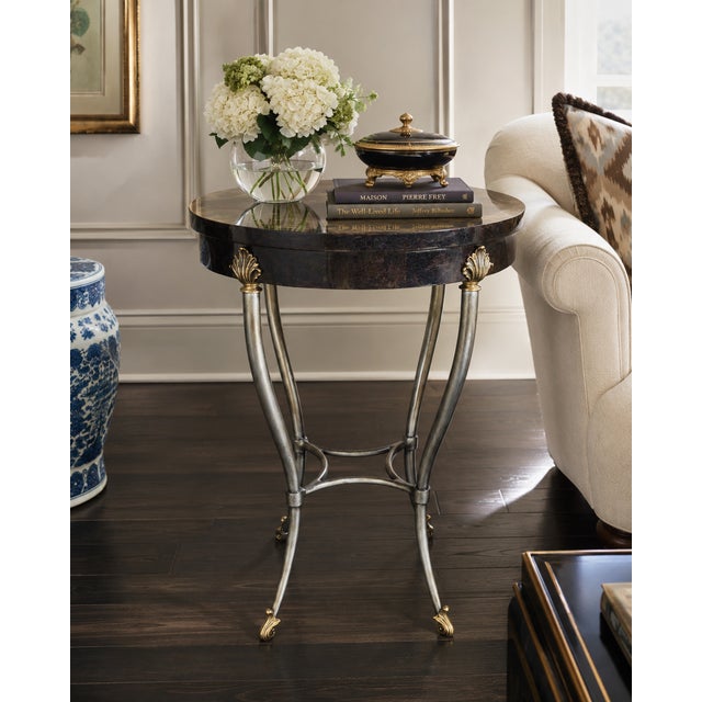 Sophisticated and highly decorative, this Ethan Allen accent table combines neoclassical styling with contemporary...