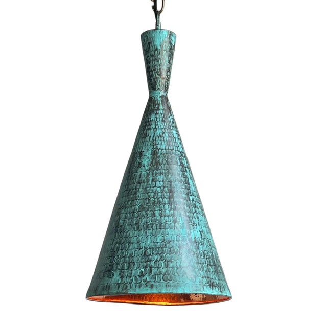Hand hammered copper cone pendant light with beautiful verdigris turquoise finish on exterior and bright copper interior....