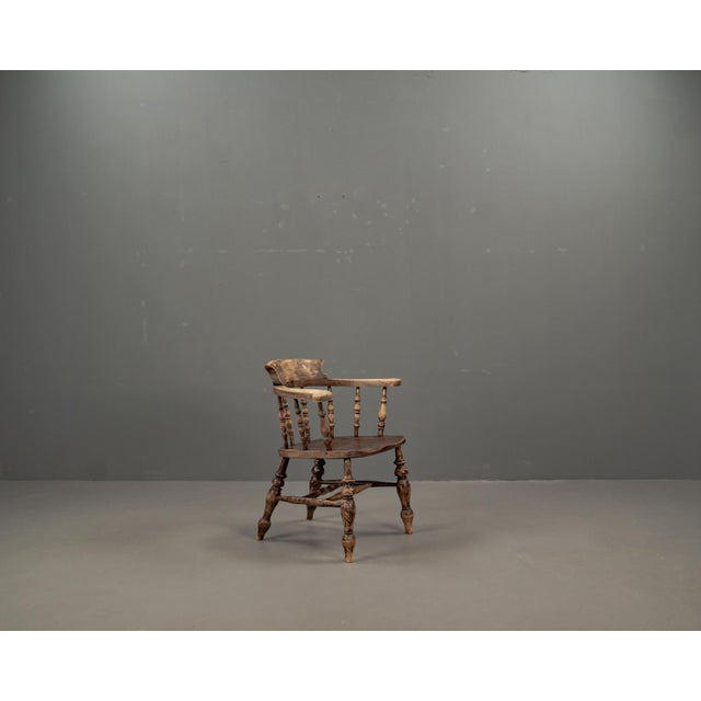 English Victorian elm wood Capitan armchair, circa 1890s. Capitan armchair with a stamped signature, comes from the High...