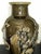 These exquisite oversized Asian ceramic jars/vases stand 18” tall. Each is handmade and unique with a bas relief dragon...