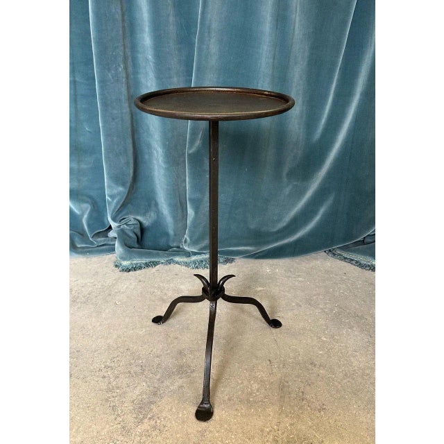 Recently handcrafted in Spain, this elegant iron martini table is inspired by vintage Spanish designs of the 1950s. The...
