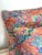 Brightly colored and patterned pair of vintage throw pillows. Fabric is slick and silky to the touch. Please see condition...