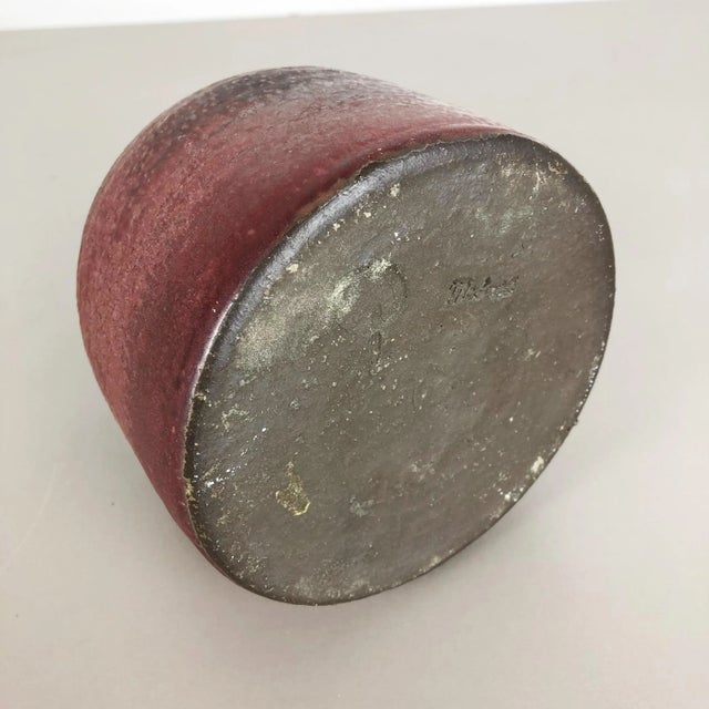 This original vintage studio pottery vase was produced in the 1960s by Piet Knepper for Mobach in Utrecht, Netherlands. It...