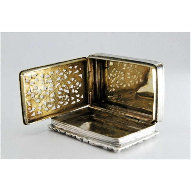 George IV Silver and Gold Vinaigrette Box with Friezes and Reliefs, in Very Good conditions. Designed before 1890 This...
