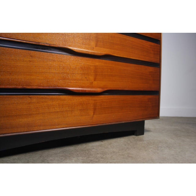 Dresser by John Kapel for Glenn of California, circa 1960 with ebony accents and curved drawer pulls. This brilliant...