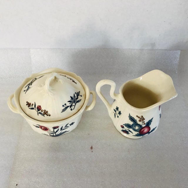 Vintage lidded sugar bowl and creamer set, makers mark reads “ Wedgwood Williamsburg potpourri Pattern” No chips or cracks...