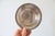 Vintage round sterling silver bowl with textured rim by Fisher. Makers mark on bottom. Does have some wear inside bowl.