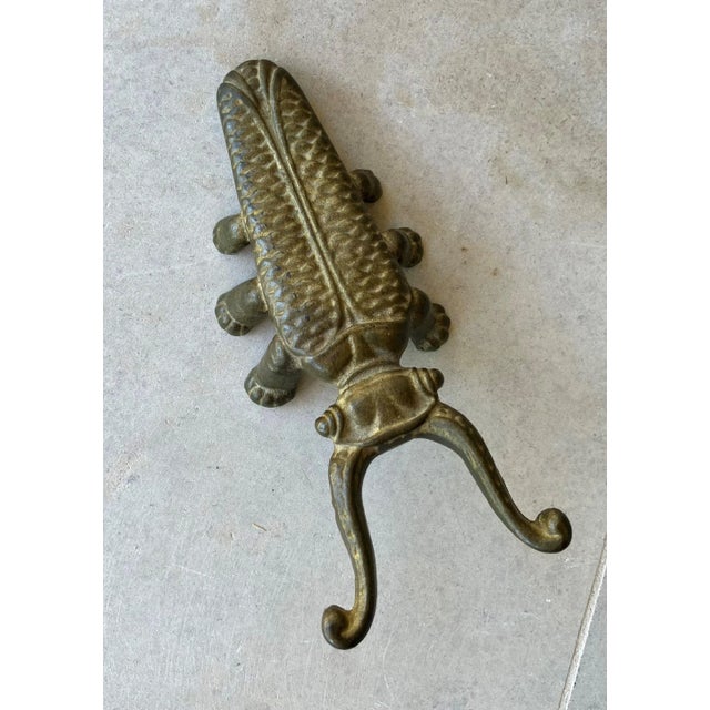 Excellent Pre-Owned Condition Funky cool solid cast brass beetle to be used for its intended purpose, boot jack, or as a...