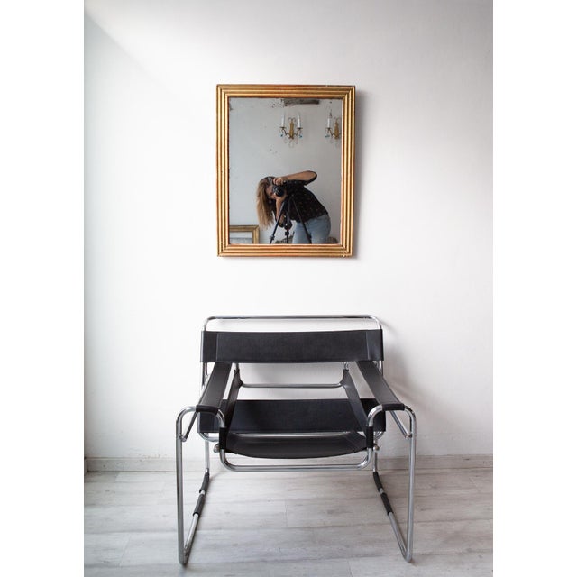 First half 19th century. Original mercury glass (The first photo is a simulation). Original gilding. New wooden back (the...