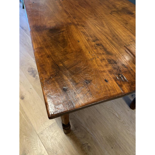 A magnificent antique colonial dining table in excellent condition. This piece is a fine example of the beauty of an...