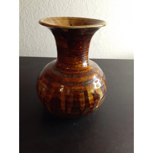 This is a Signed Pupukea Pottery Hawaii 7" Drip Glazed Art Pottery Vase. Procured at auction BOX 22