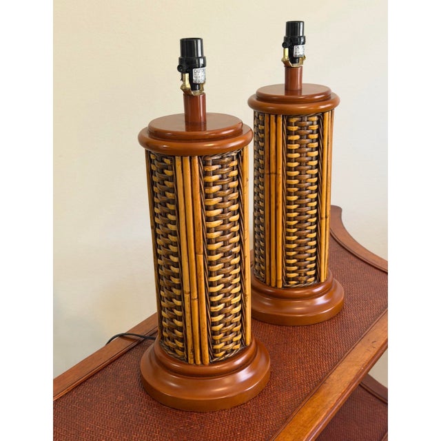 Bring warm coastal character to any room with this beautiful pair of vintage rattan and wicker table lamps. Featuring...