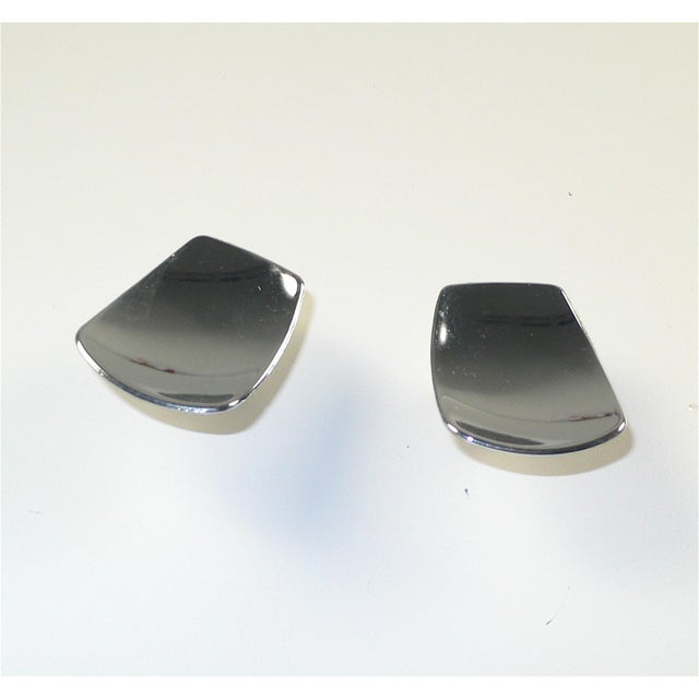Single 1950's - 1960's vintage, mid-century modern, die-cast cabinet knob in a polished chrome finish; 1 1/4” W x 1 1/2 “...