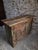 This French buffet dates from the 18th century and is made of solid walnut. The cabinet features three drawers above two...