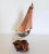 Mid-century brutalist copper sailboat with sailor and burlwood base. Very detailed. No makers mark.