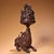 This is a cast bronze incense burner in the classic Boshan censer form, featuring a mountain-shaped lid adorned with a...