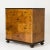 Elegant “Haga” chest of drawers by Carl Malmsten, made with stained birch veneer laid in a discreet pattern. Black painted...
