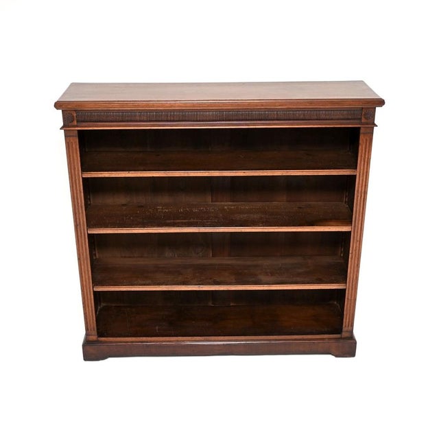 A charming and extremely well made antique Victorian open bookcase. This was made in England, it dates from around the...