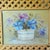 This vintage raw wood lattice framed floral oil painting by L. Tunnell is a one-of-a-kind cottagecore piece of art....