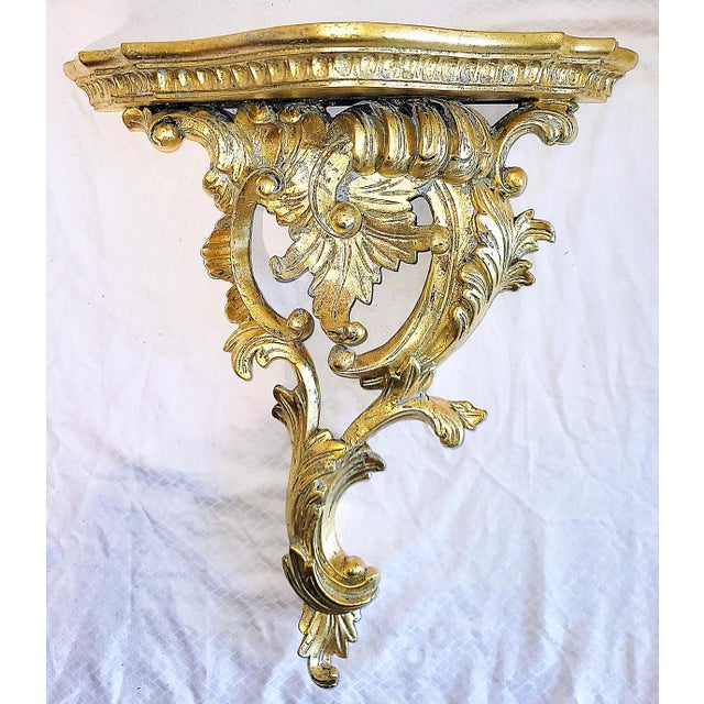 Lovely carved pair of Italian gilt wood rococo style wall brackets, finely carved throughout, 22k gold leaf, turtle...