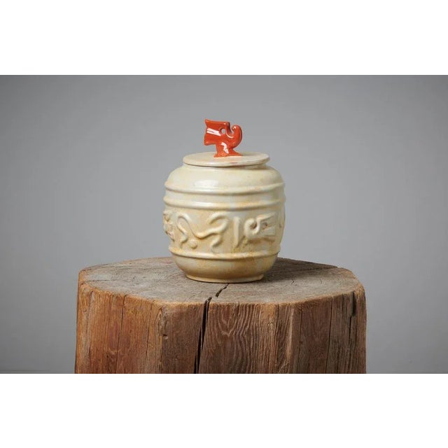 Swedish Art Deco urn from the 1920s. The urn is made in ceramics by Uppsala Ekeby and measures 18 cm tall without the lid...