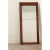 A slender, 19th century French Empire mirror with its original glass plates. The frame is made of beveled mahogany...