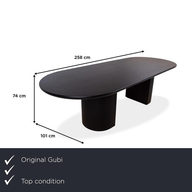 with this Gubi Moon dining table, you're bringing an absolutely captivating masterpiece of Scandinavian design directly to...